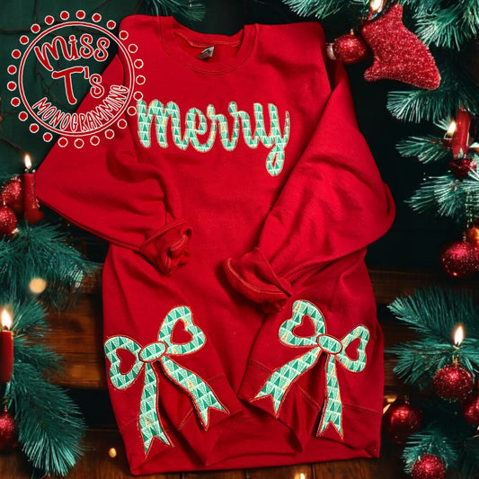 CURSIVE MERRY APPLIQUE ON RED SWEATSHIRT -SIDE BOWS