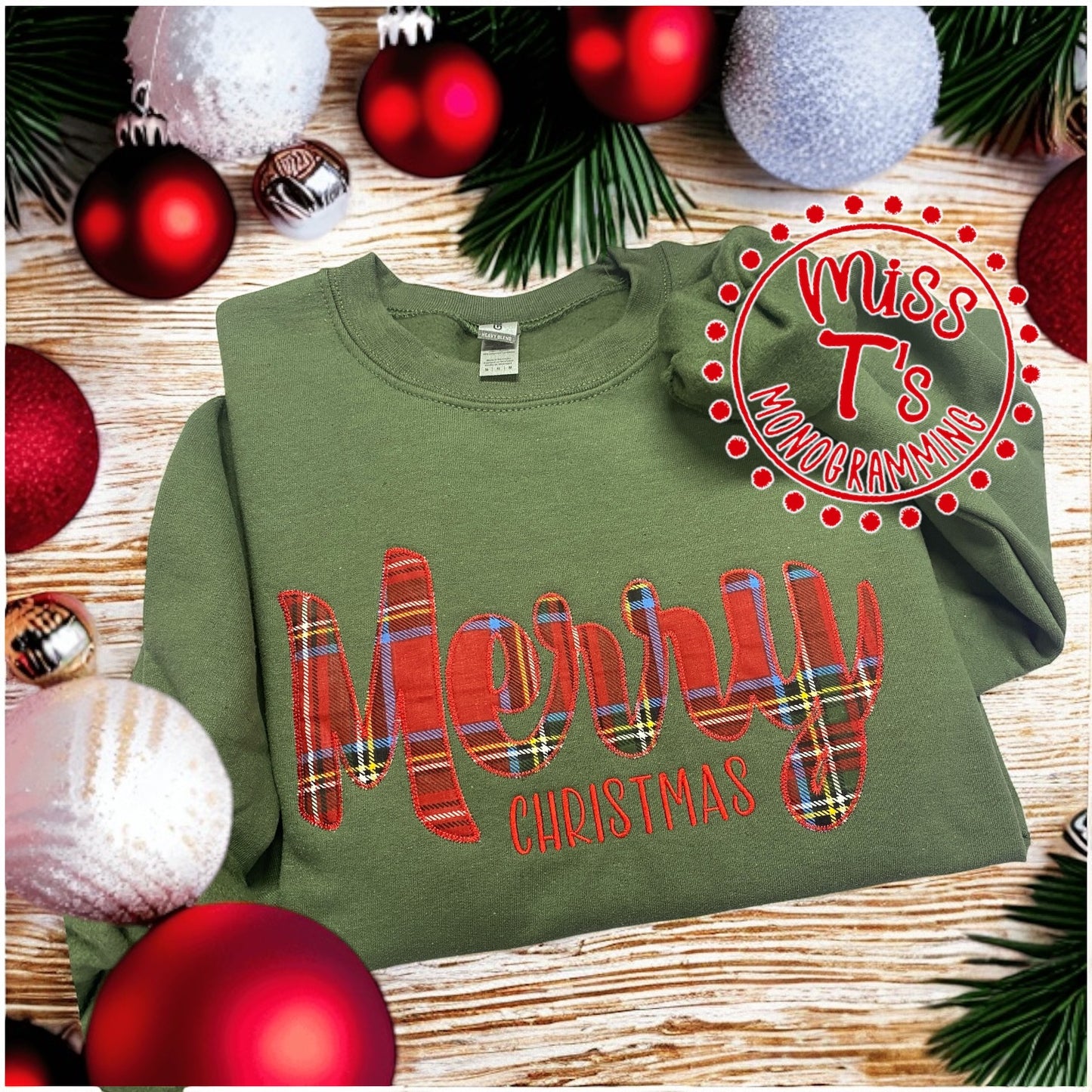 CURSIVE MERRY CHRISTMAS RED PLAID APPLIQUE ON GREEN SWEATSHIRT -SIDE BOWS