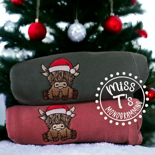 CHRISTMAS HIGHLAND COW WITH SANTA HAT EMBROIDERED SWEATSHIRT